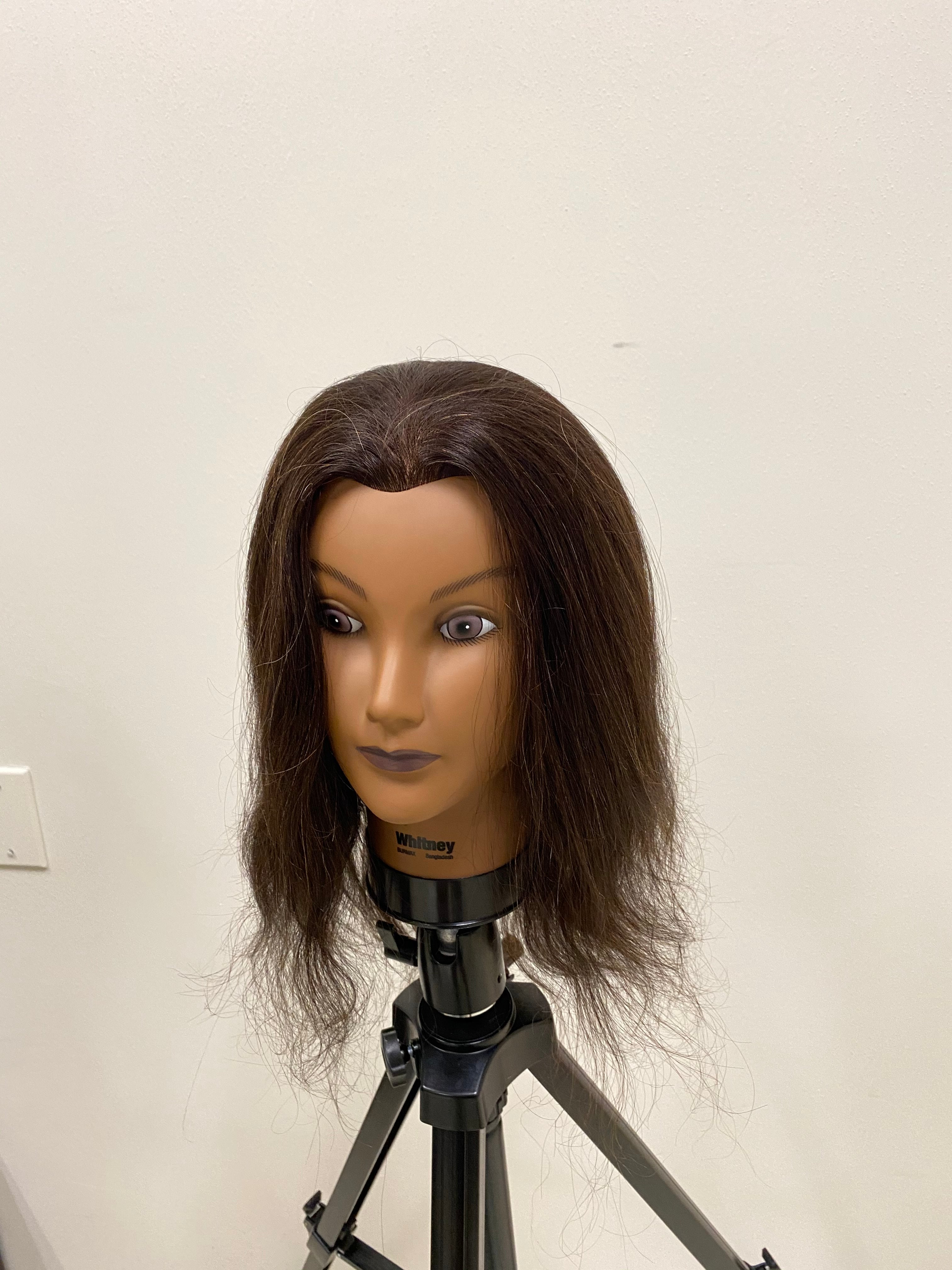 Mannequin head human hair and outlets stand.